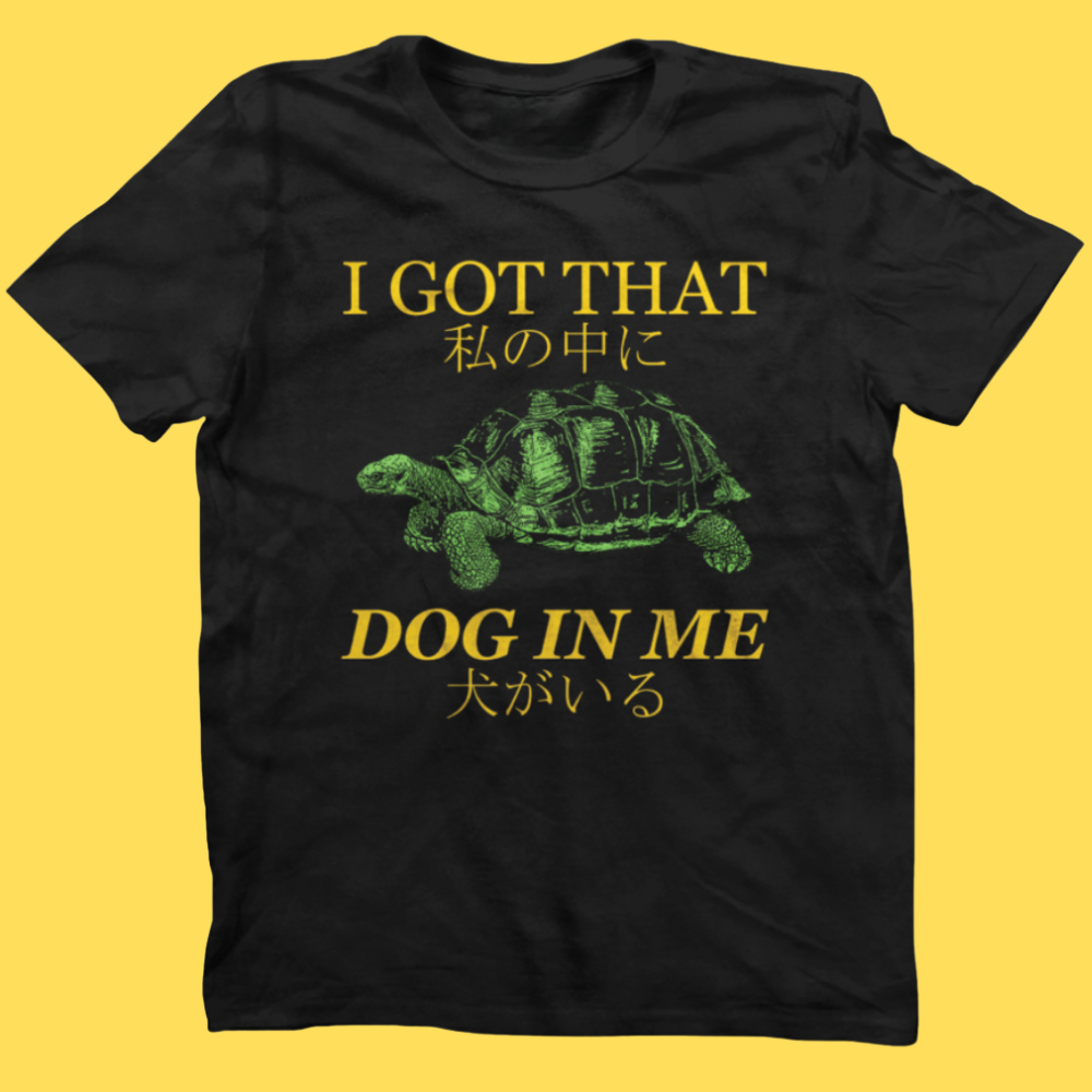 Black t-shirt with green turtle graphic and text on a yellow background