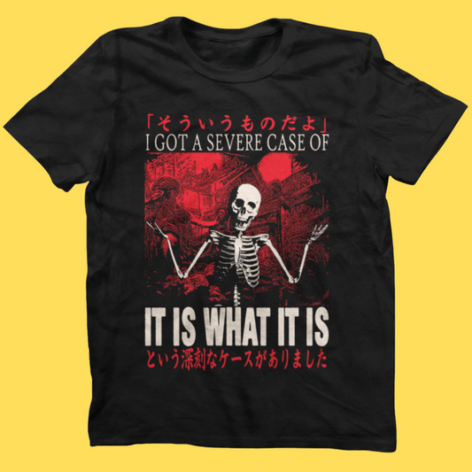 Black graphic tee featuring a skeleton with 'I GOT A SEVERE CASE OF IT IS WHAT IT IS' text and Japanese characters on yellow