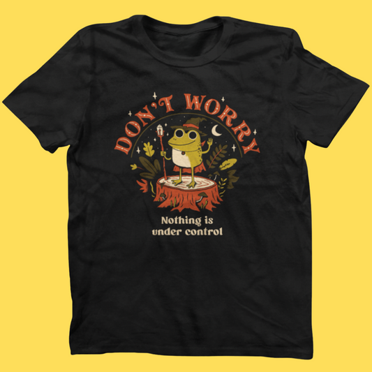 Black graphic tee featuring a cheerful frog on a stump with text 'Don't Worry Nothing is under control' in retro style.