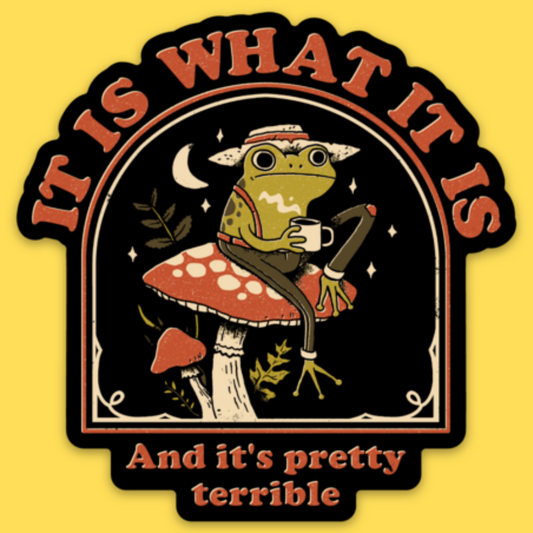 Vinyl sticker featuring a quirky frog sitting on a red mushroom holding a mug under moonlight with text 'It's What It Is'