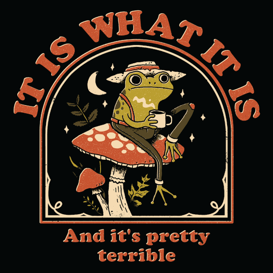 Black graphic tee featuring a whimsical frog on a mushroom holding a coffee cup with text 'It Is What It Is' and 'And it's
