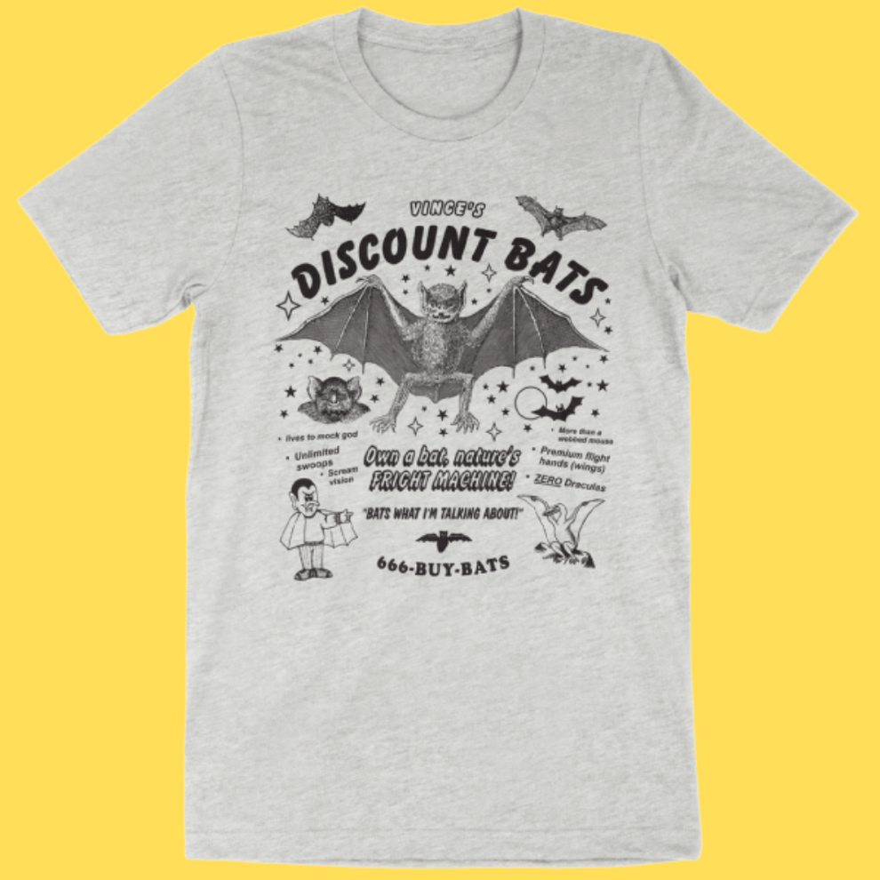 Gray t-shirt with black vintage-style bat advertisement graphic featuring 'Discount Bats' text, flying bats, and retro