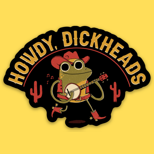 Vinyl sticker featuring a cartoon frog in cowboy hat playing banjo with cacti, text 'Howdy, Dickheads' on yellow background.