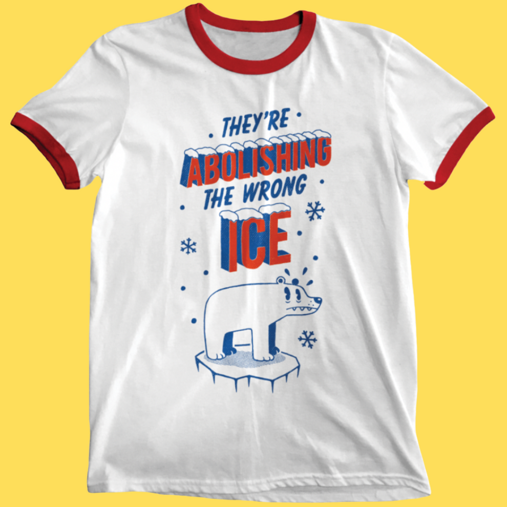 Ringer tee with polar bear on ice floe and text 'They're Abolishing The Wrong Ice' in blue and red.