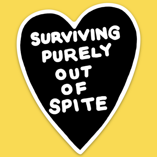 Black heart sticker with white border on yellow background displaying text 'Surviving Purely Out Of Spite'