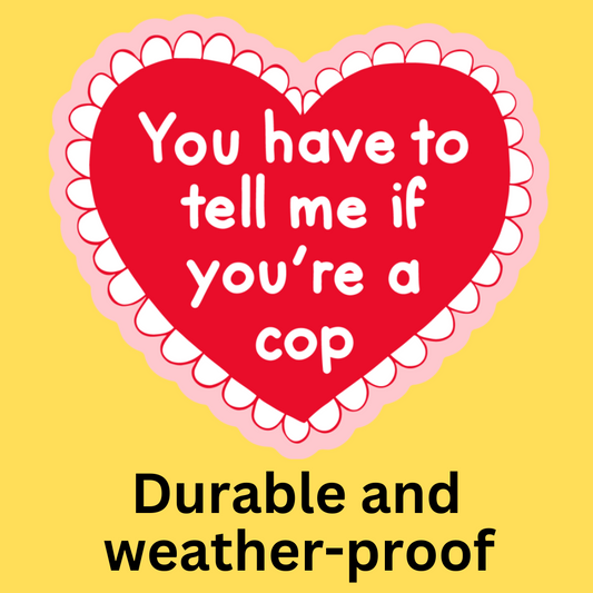 Vinyl sticker with red heart on yellow background featuring text 'You have to tell me if you're a cop'