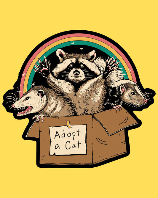 Bumper sticker featuring a raccoon, opossum and skunk in a box labeled Adopt a Cat under a rainbow, dark humor