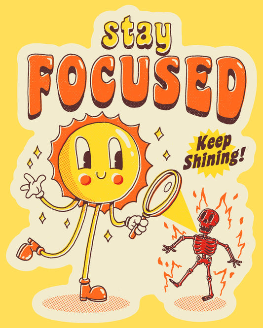 Vinyl sticker featuring a retro sun mascot frying a skeleton with a magnifying glass, Stay Focused Keep Shining text