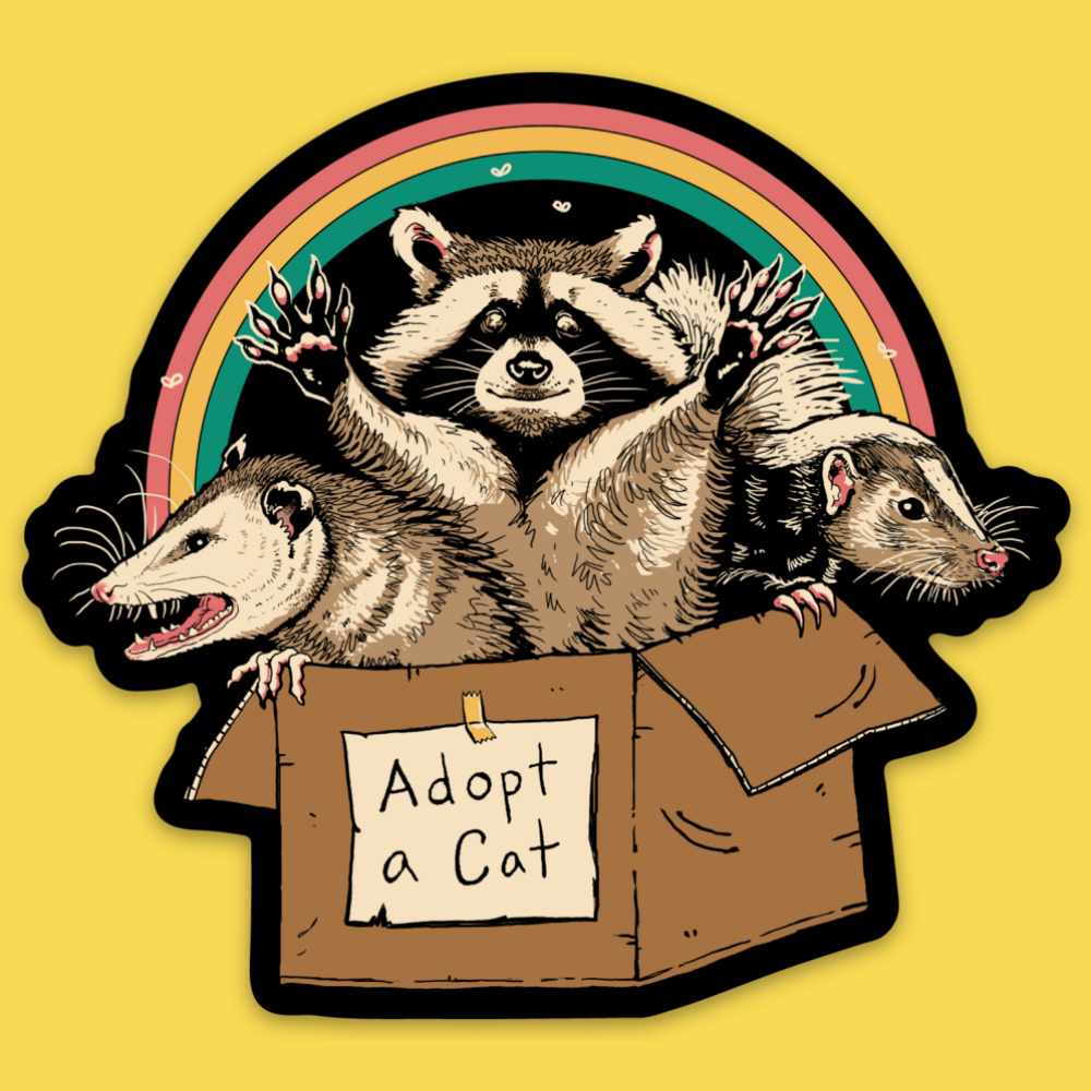 Vinyl sticker of three animals in a cardboard box with rainbow, text reads 'Adopt a Cat', yellow background