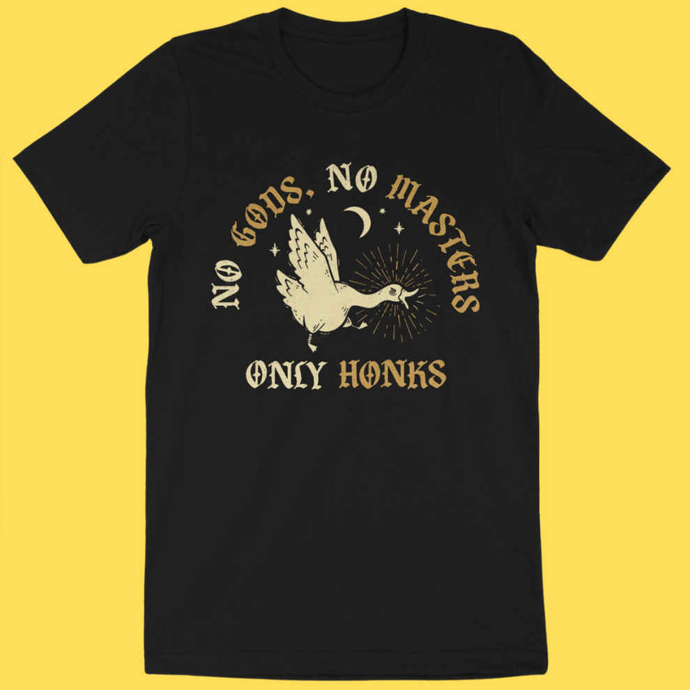 Black graphic tee with cream dove and moon design, text reads 'No Gods, No Masters' and 'Only Honks' in mystical style