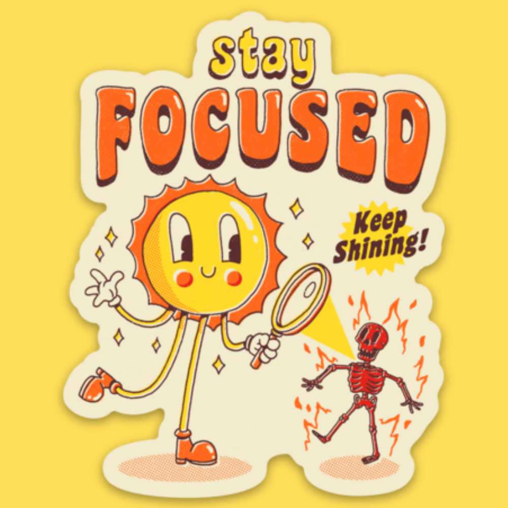 Vinyl sticker featuring a cheerful sun character with magnifying glass next to a skeleton, text reads 'Stay Focused' and