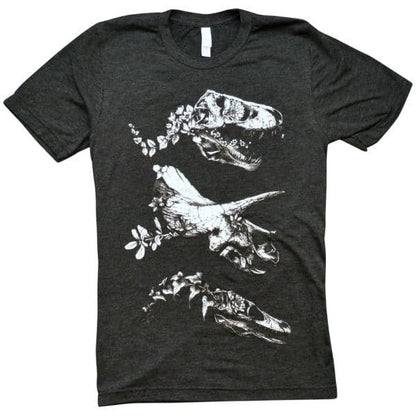 graphic tee of dinosaur bones that are shaped by flowers